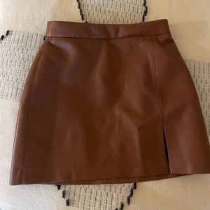 Brown / chestnut faux leather skirt from Aritzia, never worn